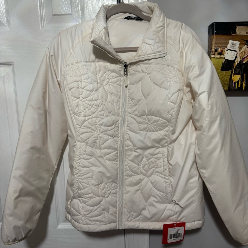 White/cream North Face Jacket